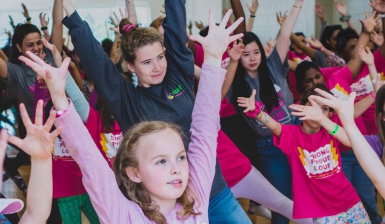 women and girls exercising